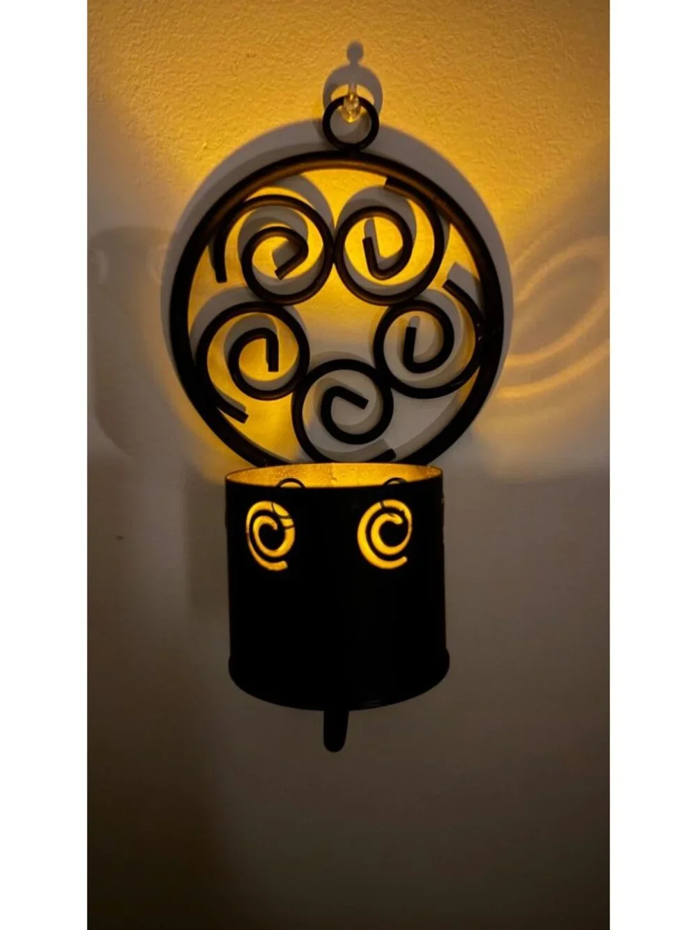 Black metal wall candle sconce